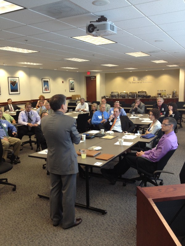 Tim Sample, vice president for special programs, Battelle, talks cyber issues and national security at the September luncheon.